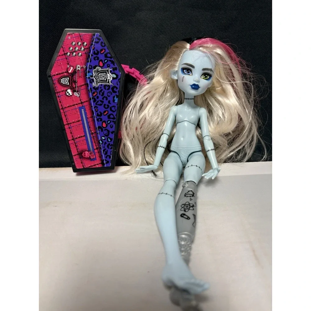 Monster High Frankie Stein Doll lot with Bonus Monster accessory.
